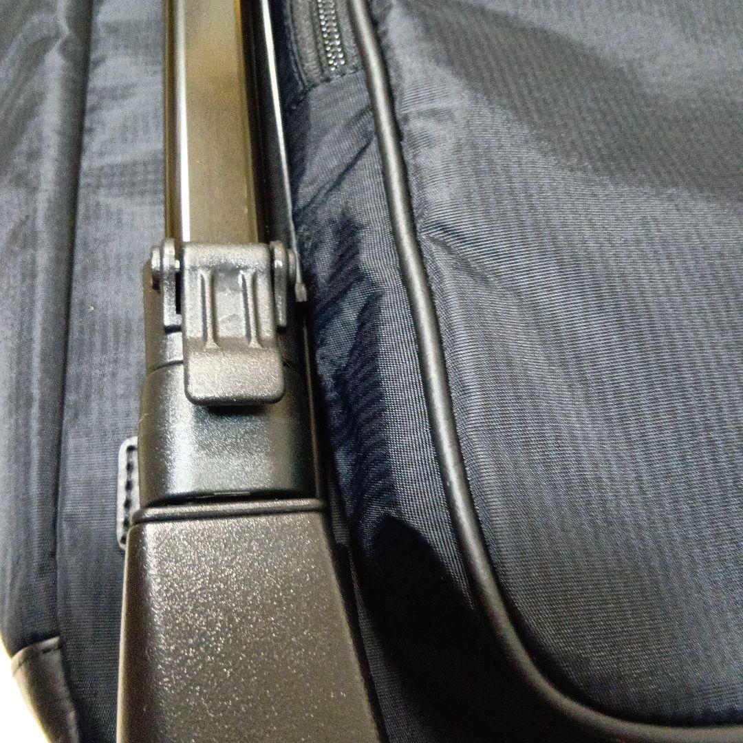 SWANY　スワニー4輪 キャリーバック　ケース 黒にリボン　ストッパー付き