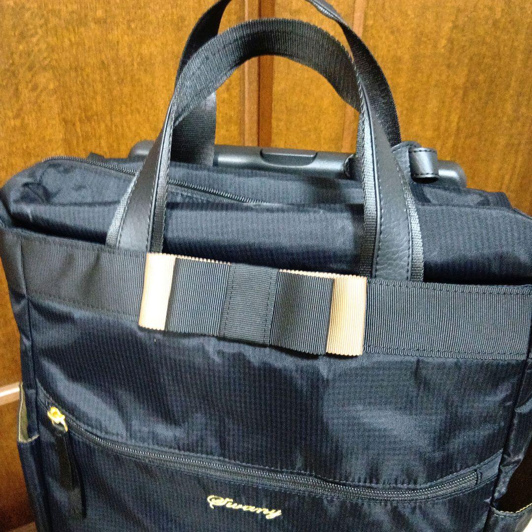 SWANY　スワニー4輪 キャリーバック　ケース 黒にリボン　ストッパー付き