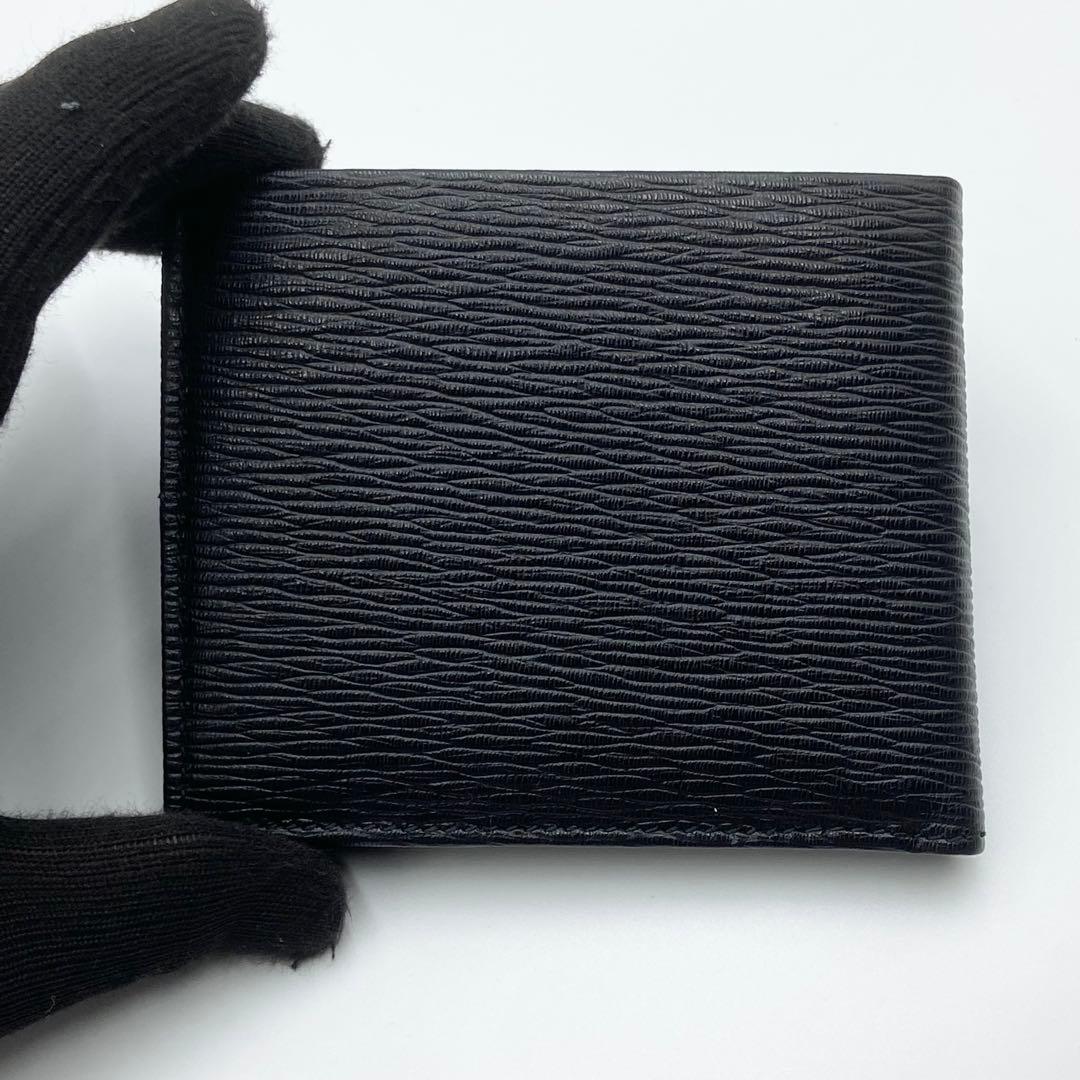 新品未使用　サルヴァトーレフェラガモ　折り財布　レザー　ブラック　イタリア製