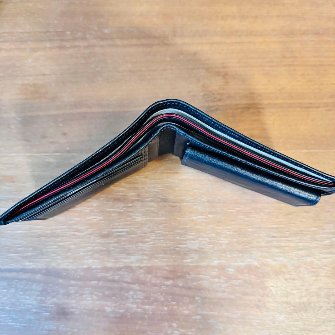 TUMI 二つ折り　財布　MODERIST 017099D