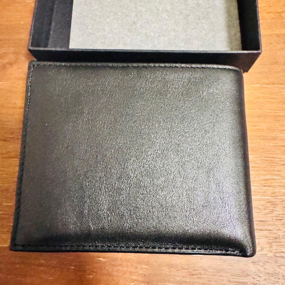 TUMI 二つ折り　財布　MODERIST 017099D