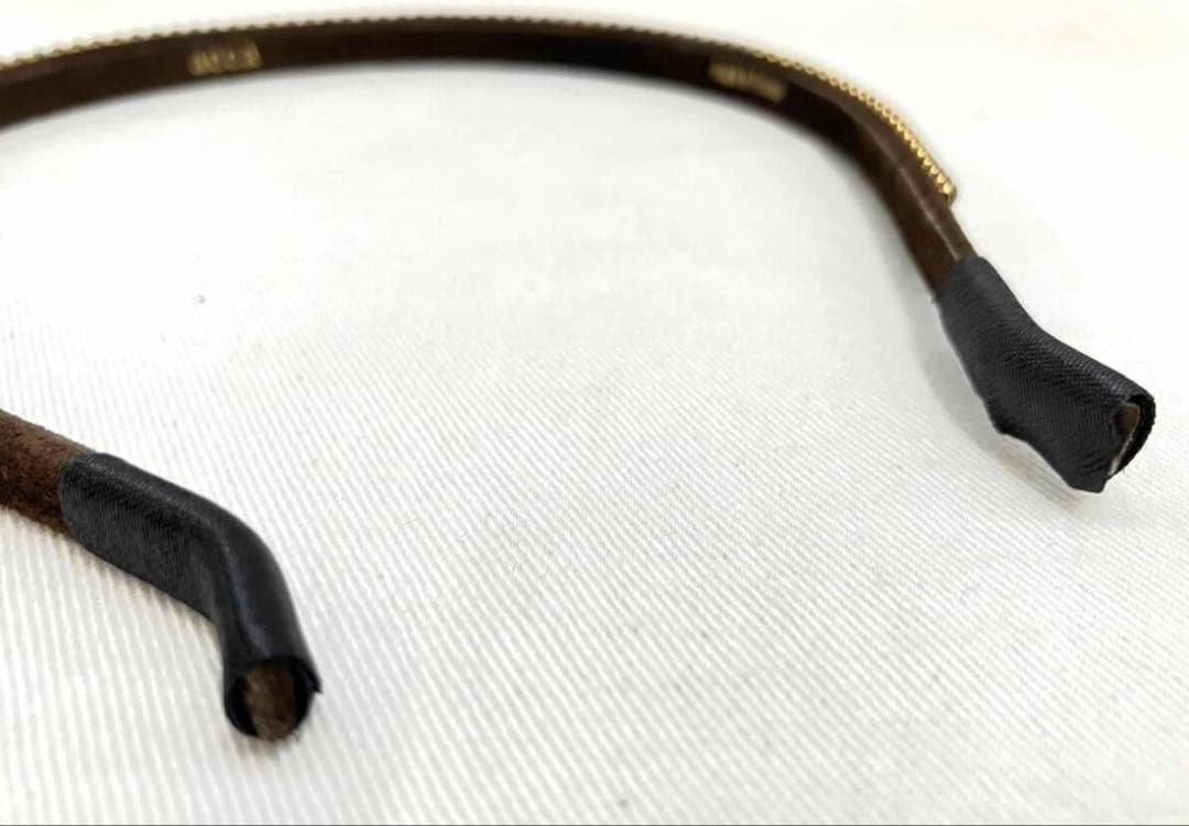 アッカ スワロフスキー カチューシャ ブロンズ ヘアアクセサリー 巾着付