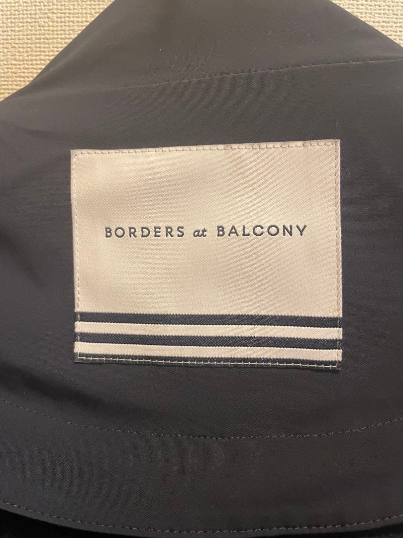 【ボーダーズアットバルコニー】フリル付きロングコート