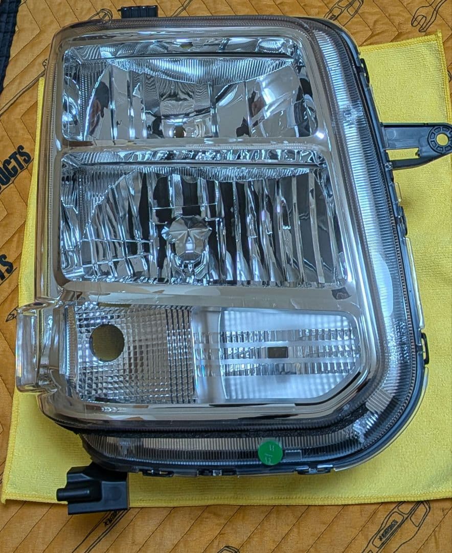 DA17V右ヘッドライト・新車取り外し（ステー補修有）