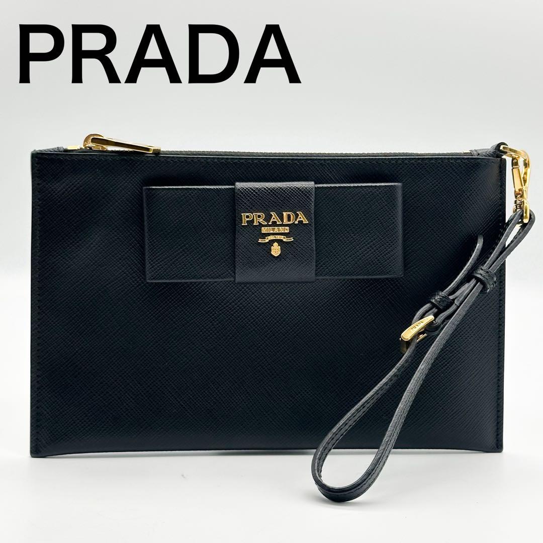 【使用わずか】プラダ リストレット リボン クラッチバッグ サフィアーノ ポーチ