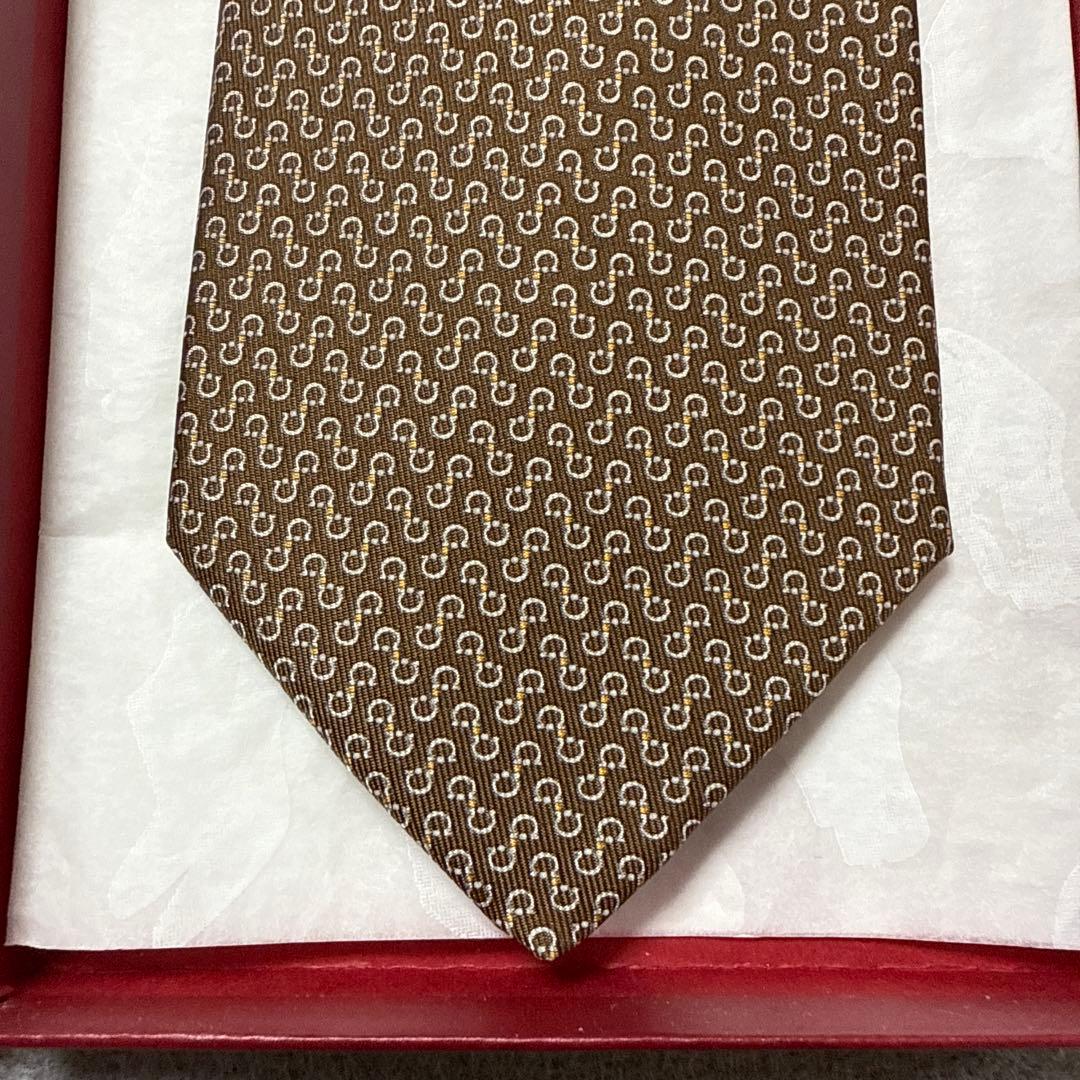 未使用タグ付　サルバトーレフェラガモ　ネクタイ　茶色　ガンチーニ柄