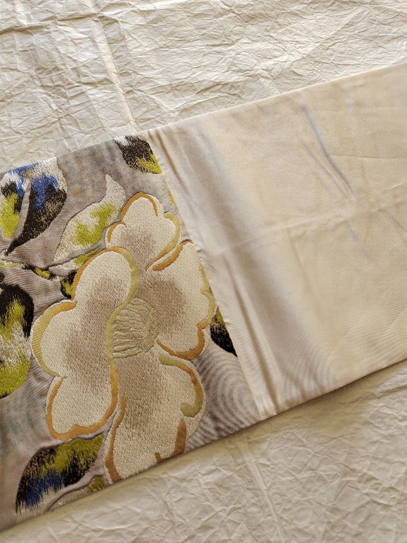 UniUni値下げ　織匠　万勝　琳派椿葉樹文　春繭　袋帯