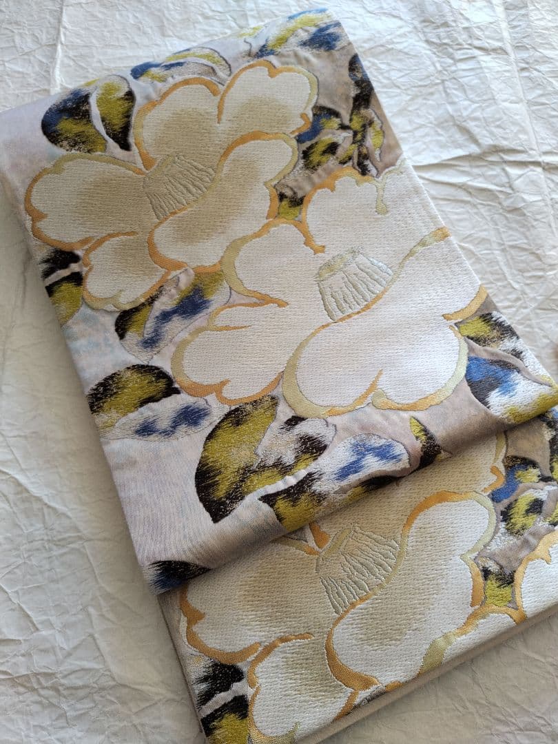 UniUni値下げ　織匠　万勝　琳派椿葉樹文　春繭　袋帯