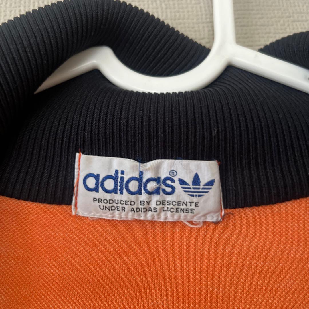 adidas オレンジ トラックジャケット