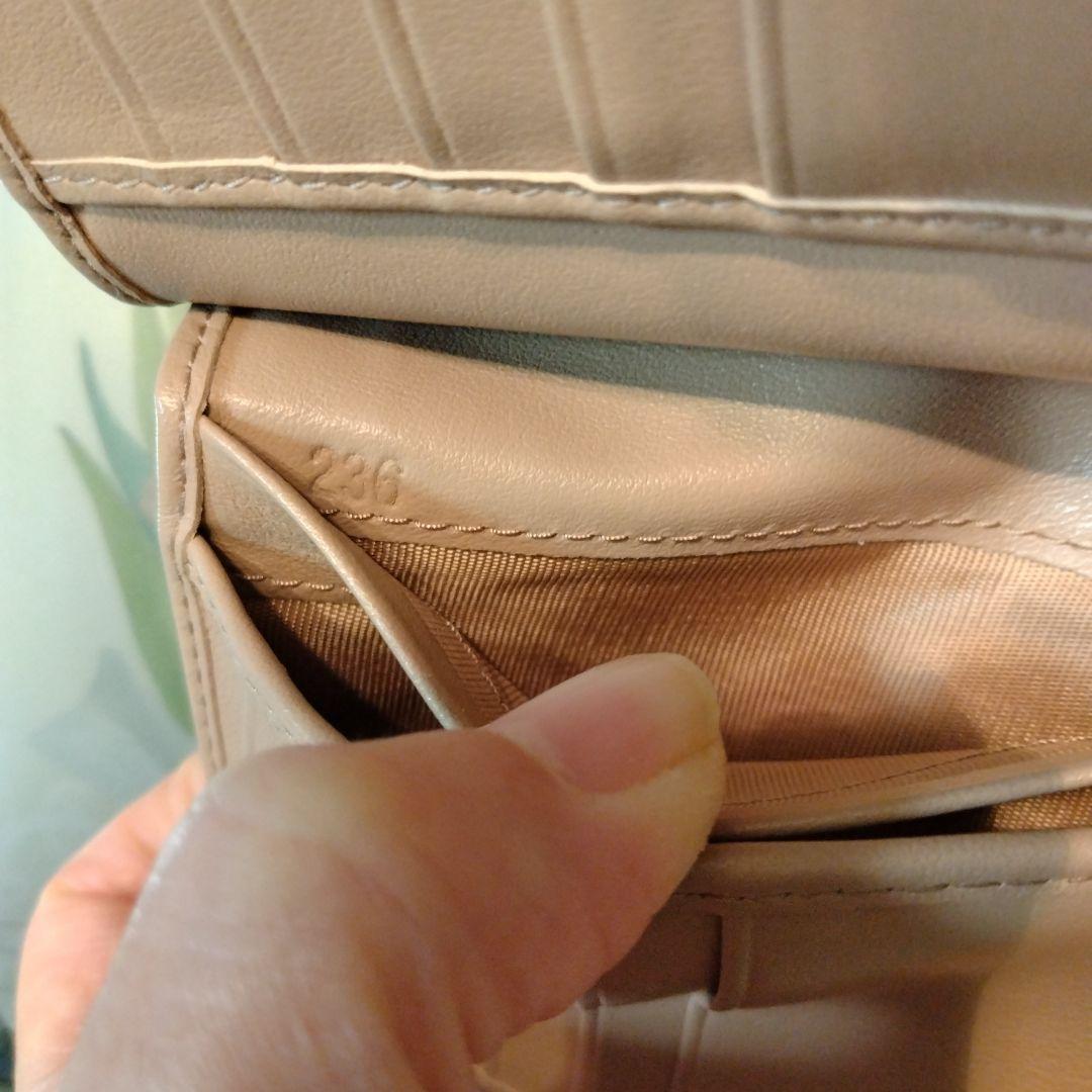 PRADA 二つ折り財布 リボン　ピンクベージュ