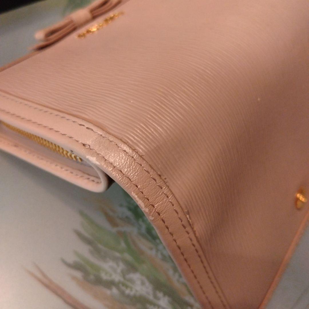PRADA 二つ折り財布 リボン　ピンクベージュ