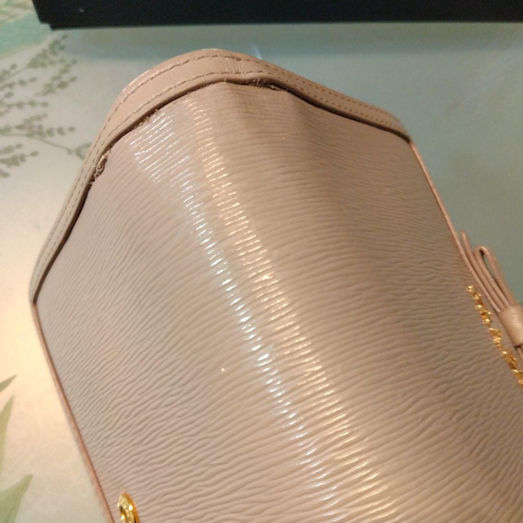 PRADA 二つ折り財布 リボン　ピンクベージュ
