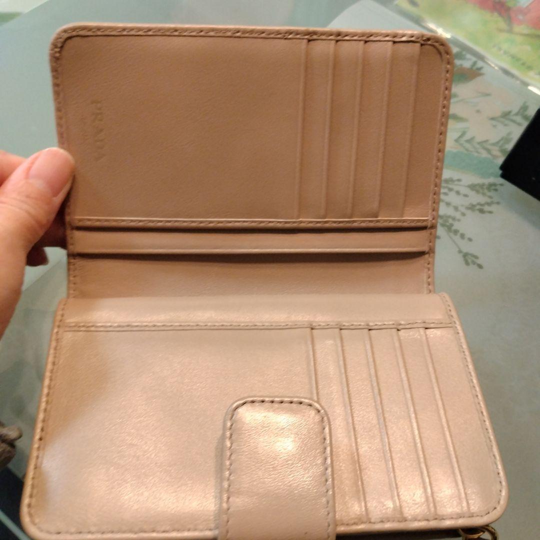 PRADA 二つ折り財布 リボン　ピンクベージュ