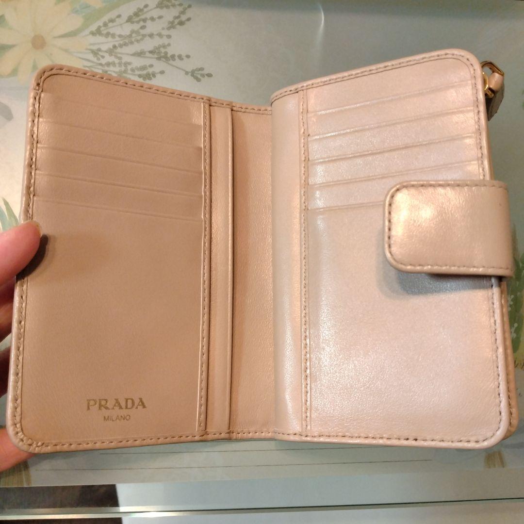 PRADA 二つ折り財布 リボン　ピンクベージュ