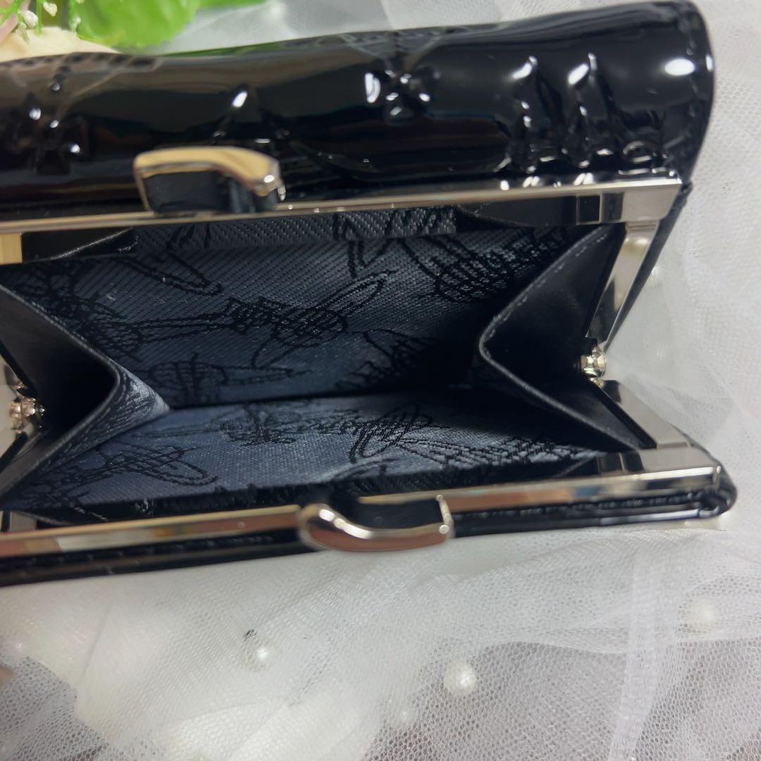 VivienneWestwoodエンボス加工の黒い三つ折り財布