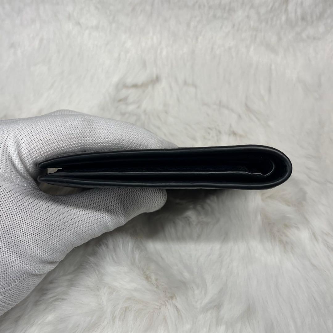 【極美品】COACH黒レザーエンボス加工二つ折り財布