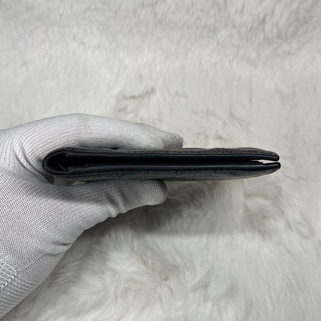 【極美品】COACH黒レザーエンボス加工二つ折り財布