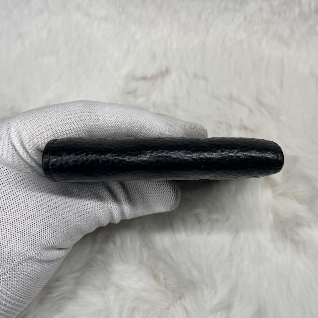 【極美品】COACH黒レザーエンボス加工二つ折り財布