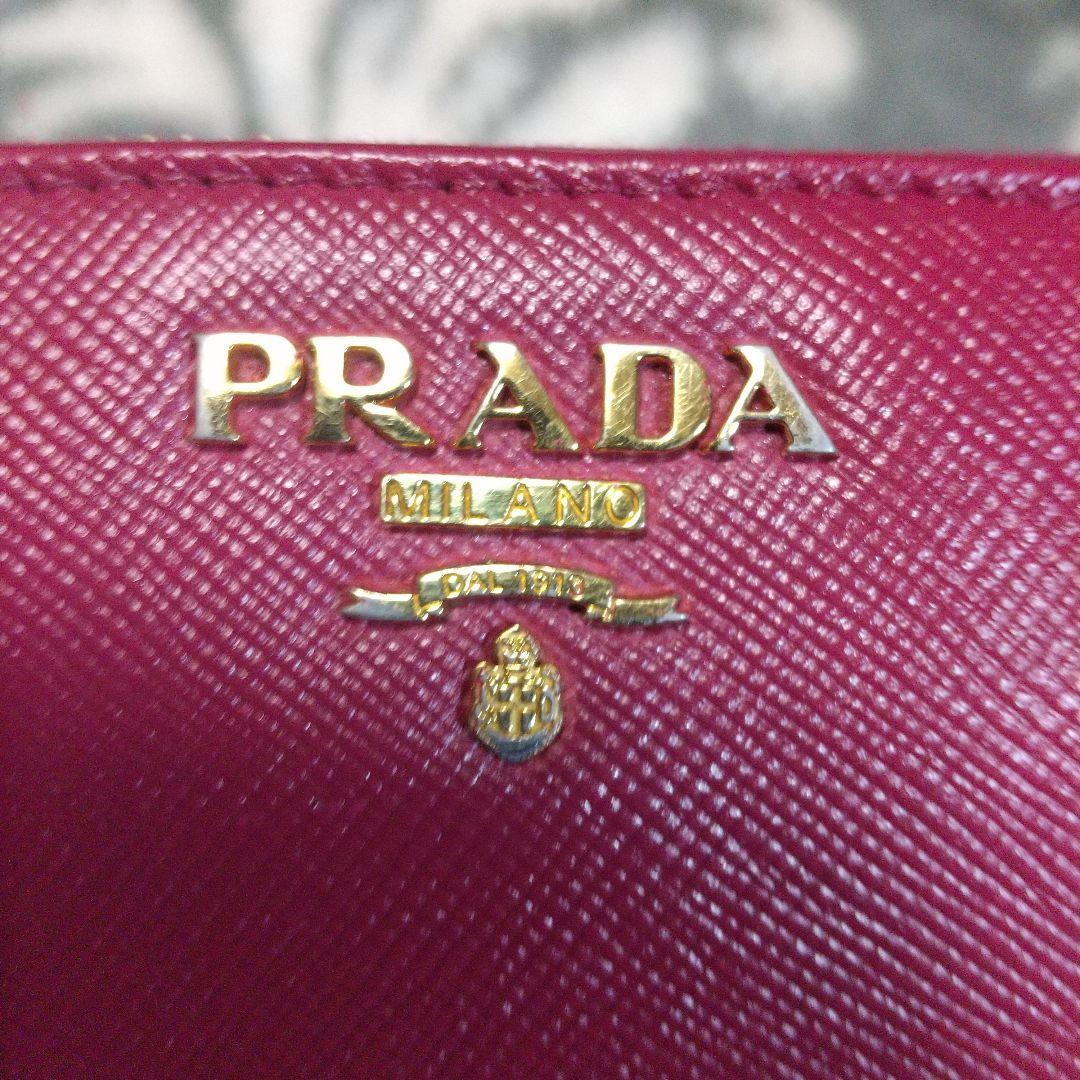 PRADA サフィアーノラウンドファスナー長財布レッド系