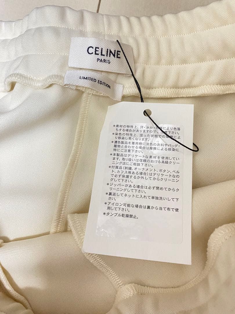 ExxxxxZCELINEサイドライントリオンフフレアトラックロングパンツ