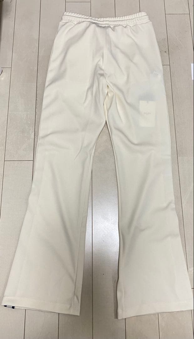 ExxxxxZCELINEサイドライントリオンフフレアトラックロングパンツ