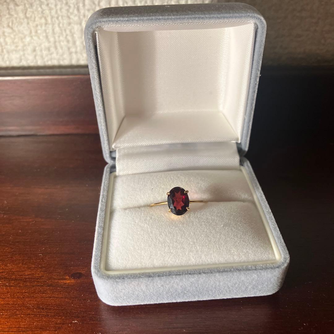 【定価￥39,200】K18ガーネットのオーバルカット爪留めリング　11号