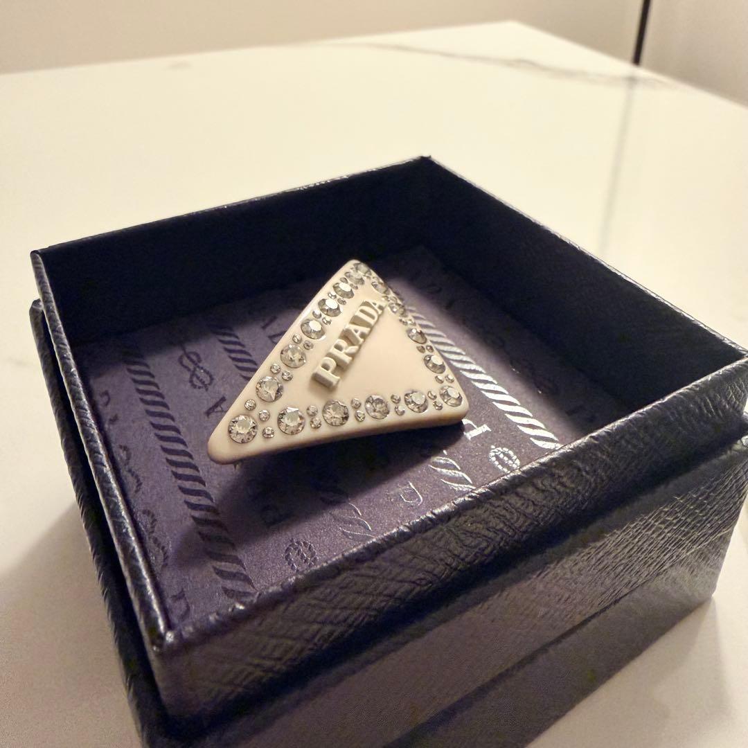 PRADA プレキシガラス ヘアクリップ