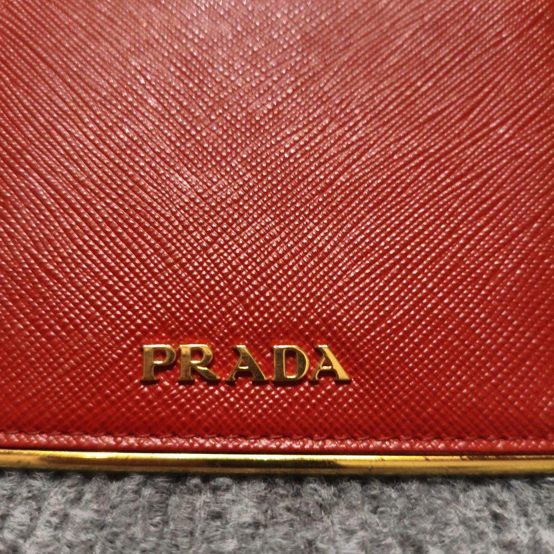 PRADA 二つ折り財布 赤
