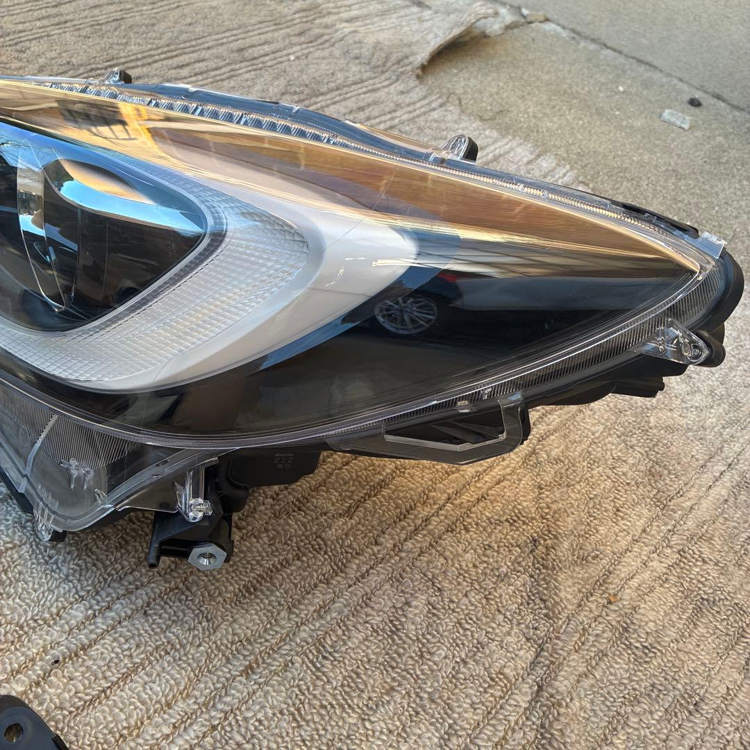 アクア　純正ヘッドライト　左側　MXPK10