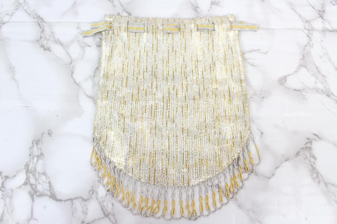 ♡Karat キャラット メタルビーズバック 巾着 ポーチ ゴールド系 ケース付