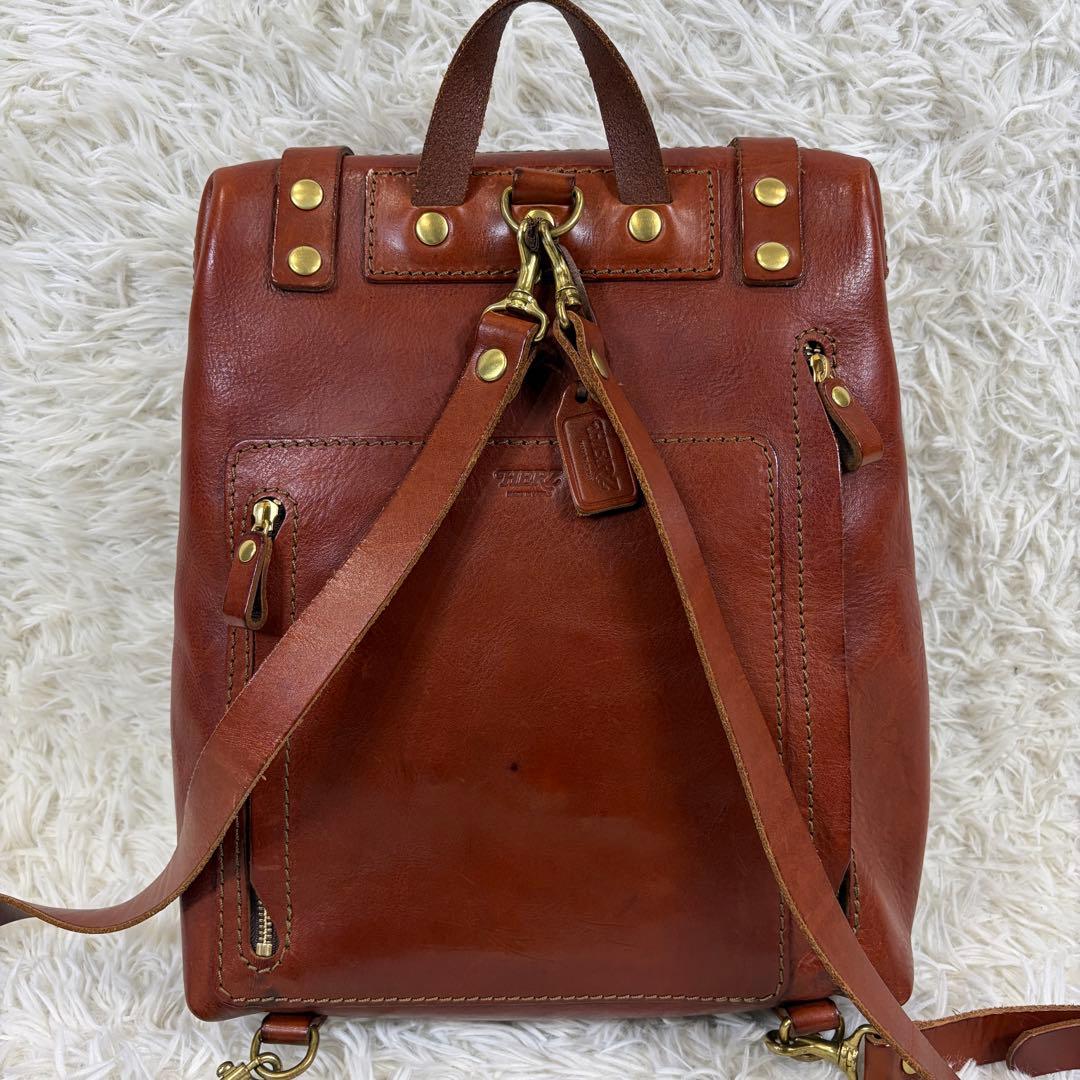 ヘルツ ラックスリュック ヌメ革 ゴールド金具 チャーム 自立 A4可ブラウン