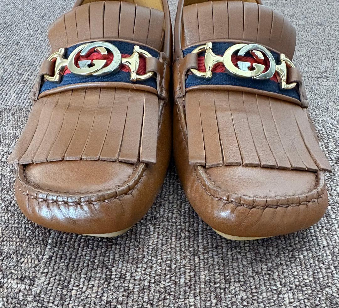 GUCCI ブラウン レザー ローファー フリンジ付き