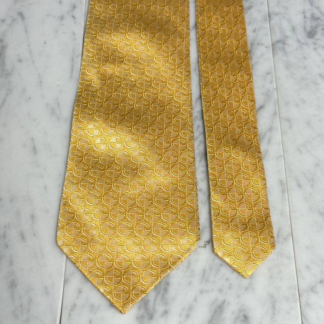 GUCCI ネクタイ Gロゴ柄 光沢 ゴールド パターン柄