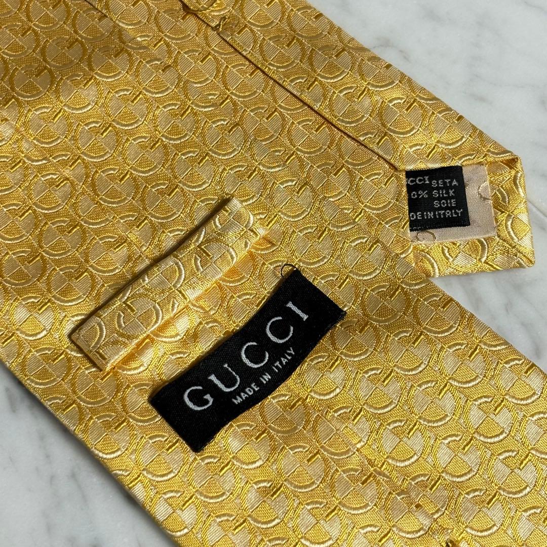 GUCCI ネクタイ Gロゴ柄 光沢 ゴールド パターン柄