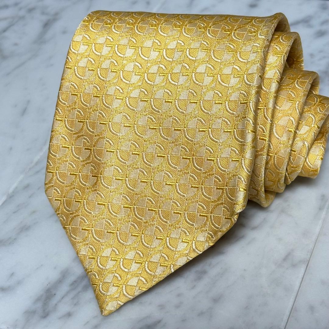 GUCCI ネクタイ Gロゴ柄 光沢 ゴールド パターン柄