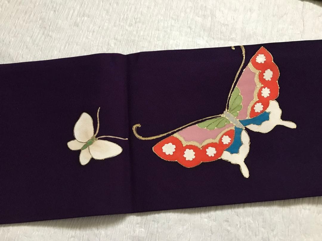 上質な塩瀬　蝶々の名古屋帯　正絹　濃い紫の地　手描き