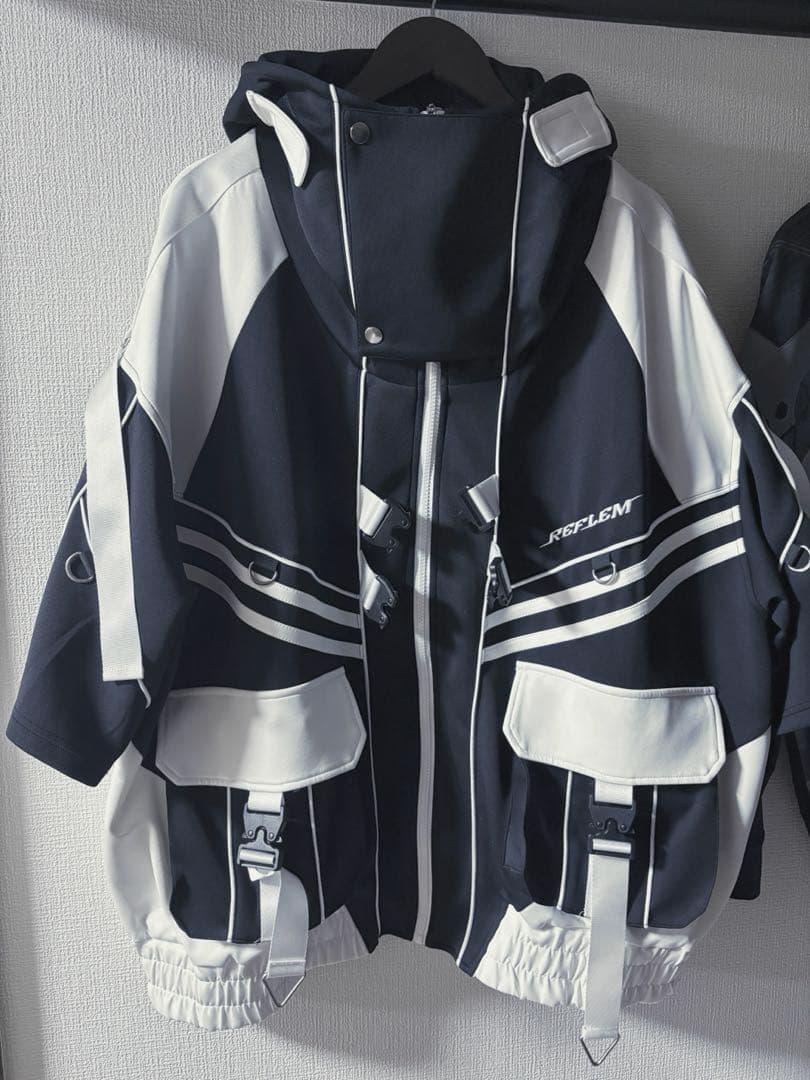 『REFLEM/レフレム』サイバー切替ハイネックジャージパーカー