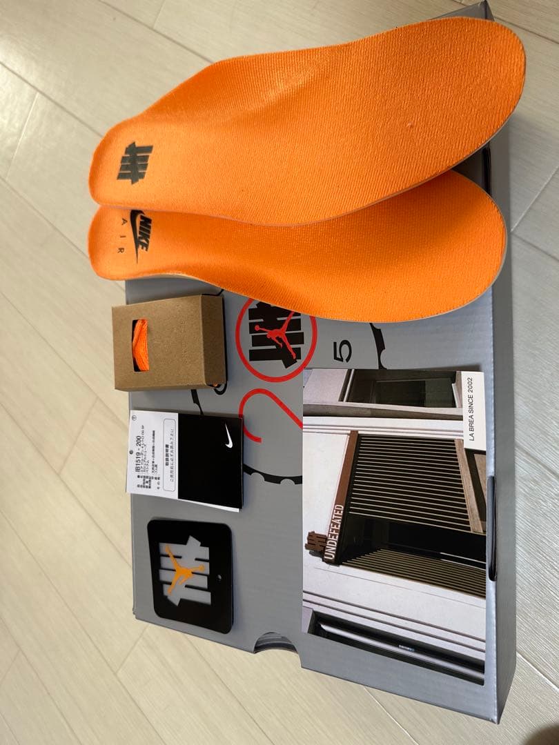 UNDEFEATED × Nike Air Jordan 4