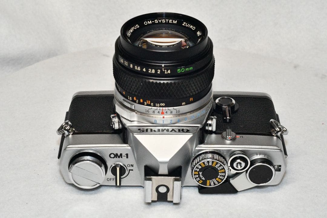 お値引き《動作品》OLYMPUS OM-1+標準レンズ付き a402