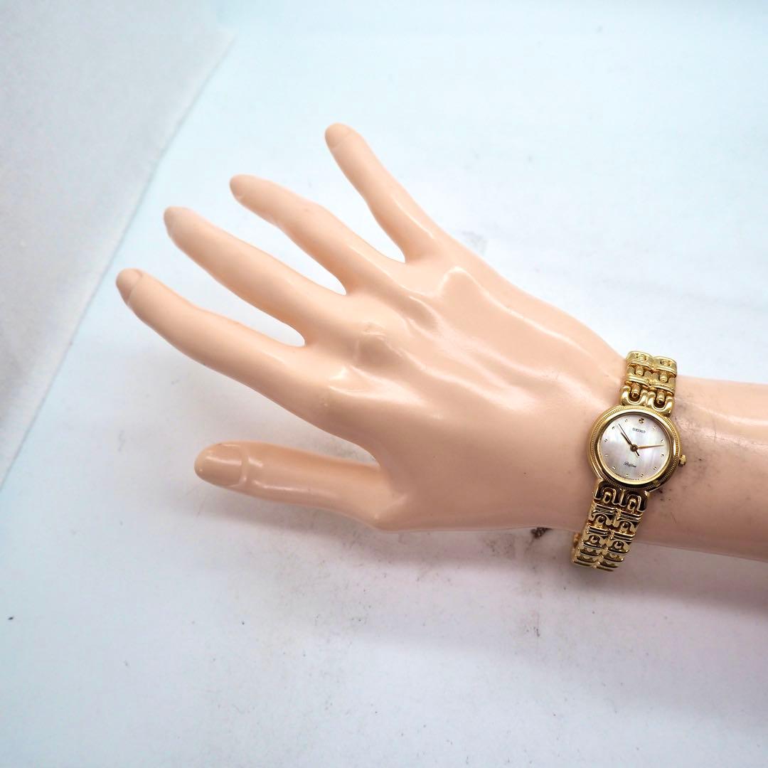 573 稼働【美品】SEIKO レディース 時計 ゴールド　ベルフィーナ　丸型