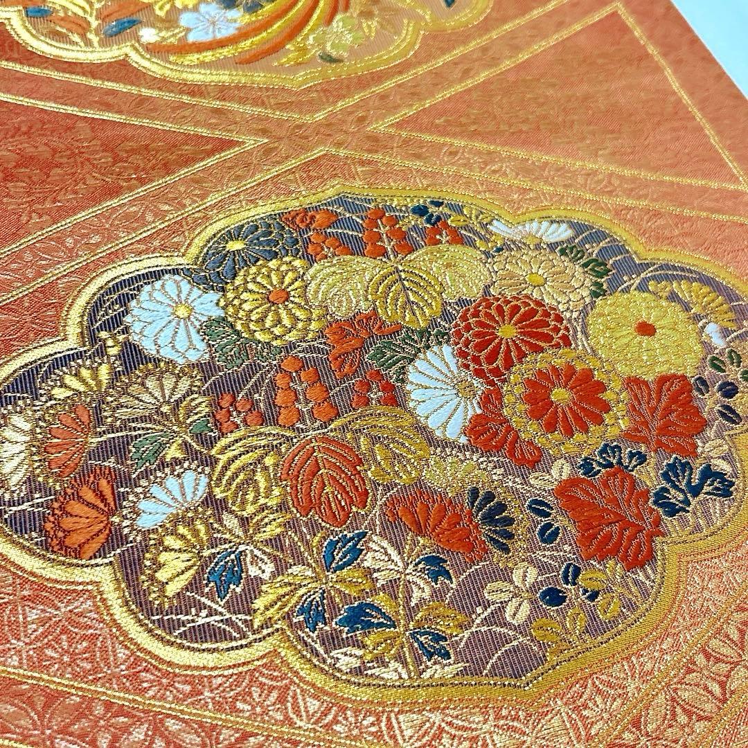 梅垣織物　袋帯　西陣織　七宝菱蒔絵文　正絹　金糸　オレンジゴールド系　逸品