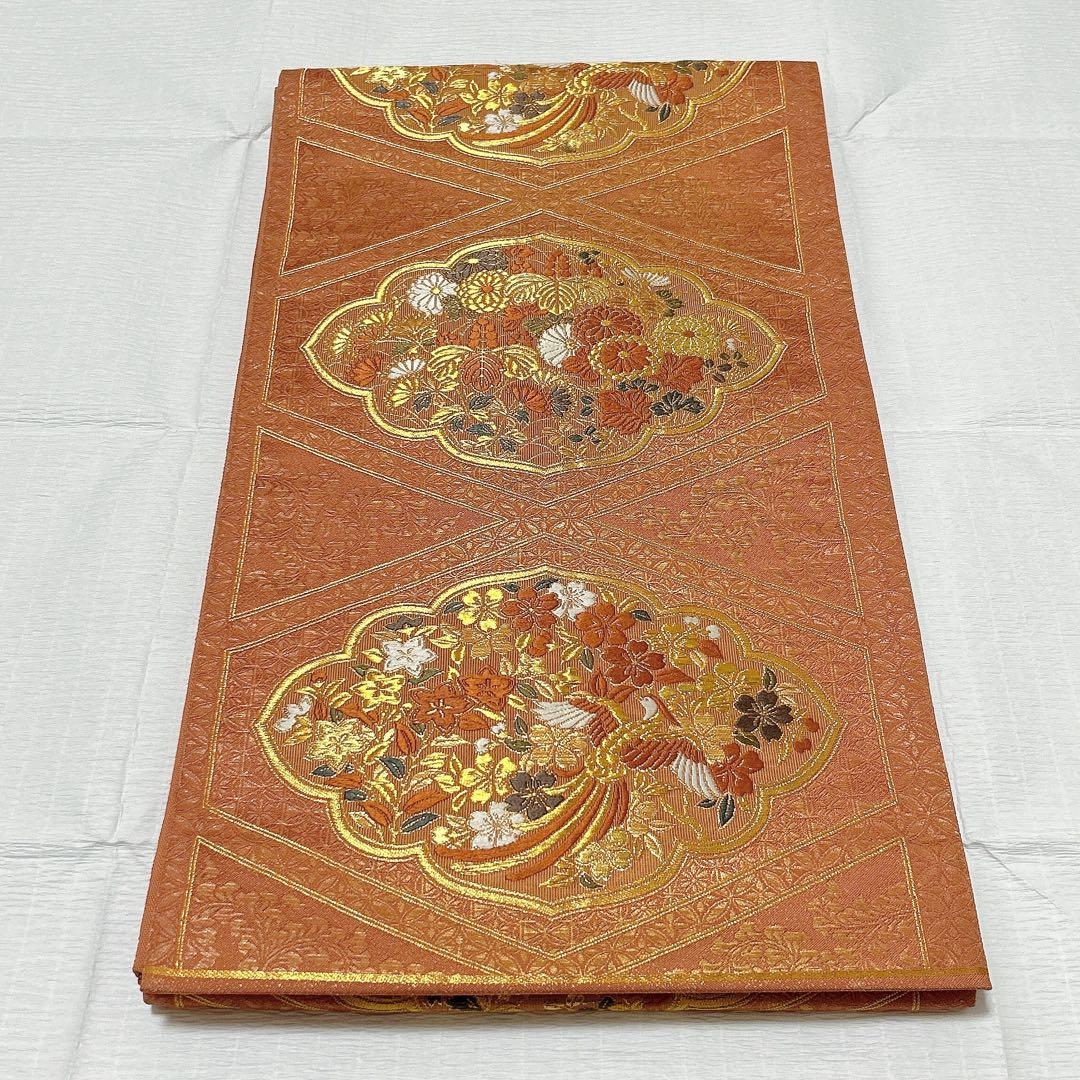 梅垣織物　袋帯　西陣織　七宝菱蒔絵文　正絹　金糸　オレンジゴールド系　逸品