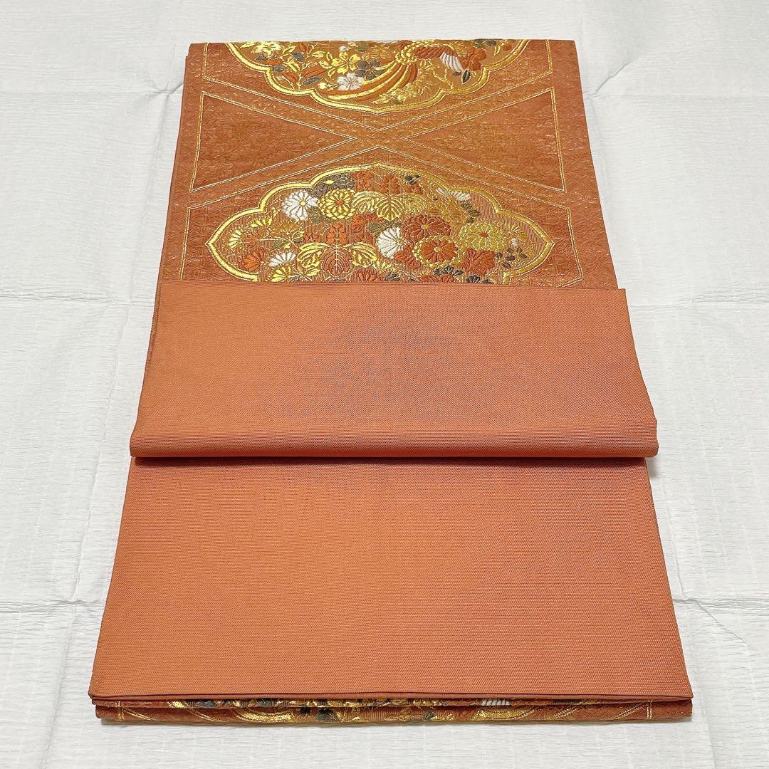 梅垣織物　袋帯　西陣織　七宝菱蒔絵文　正絹　金糸　オレンジゴールド系　逸品