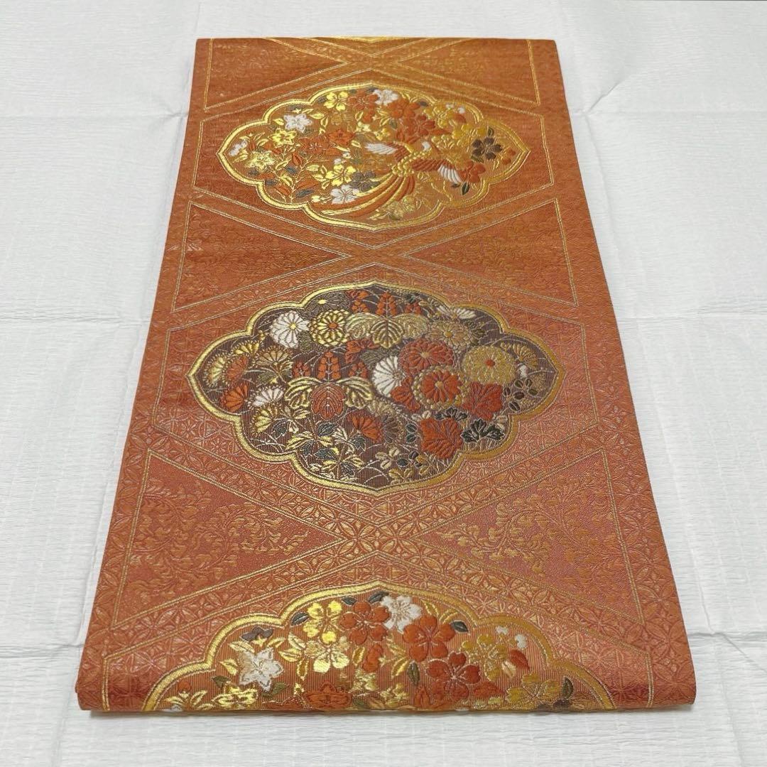 梅垣織物　袋帯　西陣織　七宝菱蒔絵文　正絹　金糸　オレンジゴールド系　逸品