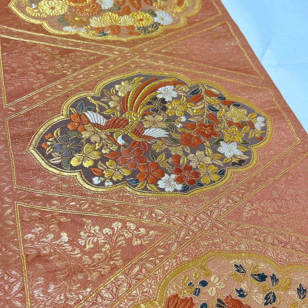 梅垣織物　袋帯　西陣織　七宝菱蒔絵文　正絹　金糸　オレンジゴールド系　逸品