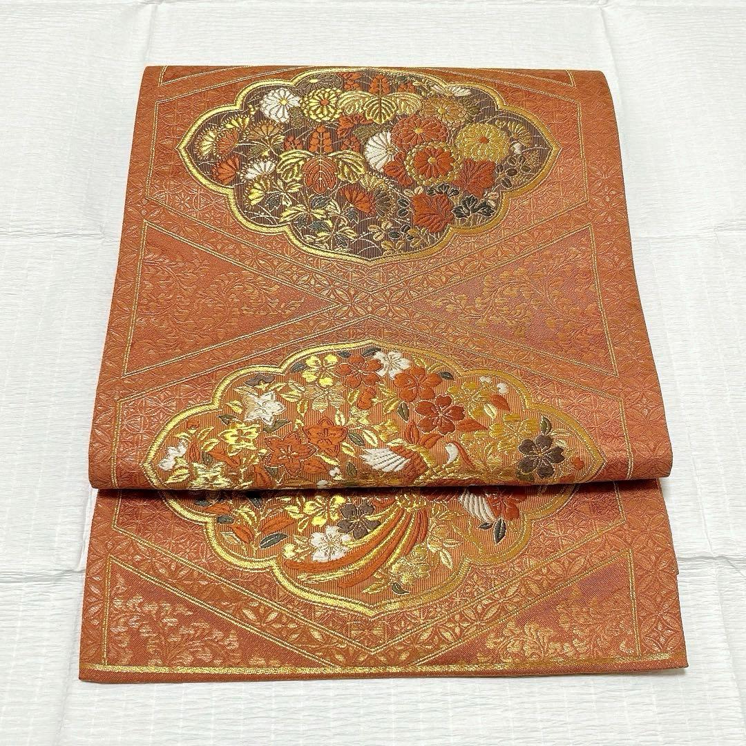 梅垣織物　袋帯　西陣織　七宝菱蒔絵文　正絹　金糸　オレンジゴールド系　逸品