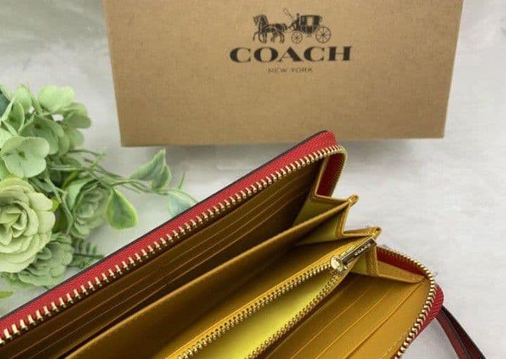 新品未使用コーチ長財布ディズニーミッキーマウスジップホワイト送料無料即日発送