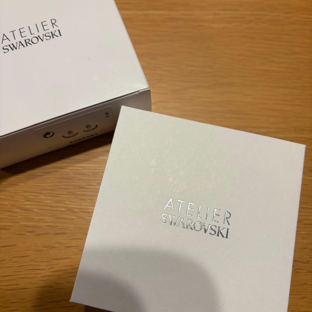 スワロフスキー MOONSUN 月 星 ピアス 愛の不時着