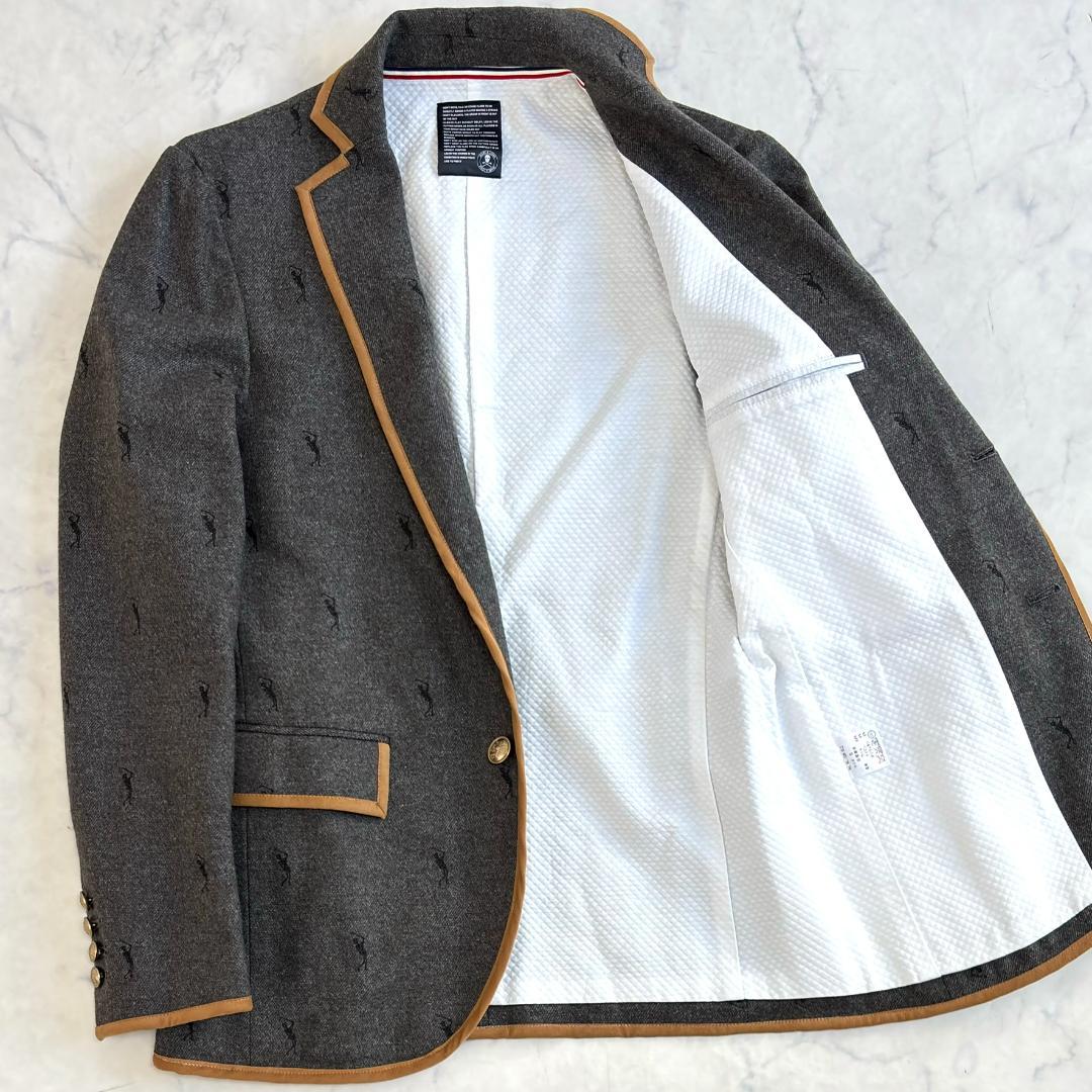 マークアンドロナ ジャケット 刺繡ロゴ パイピング 金ボタン グレー tw5