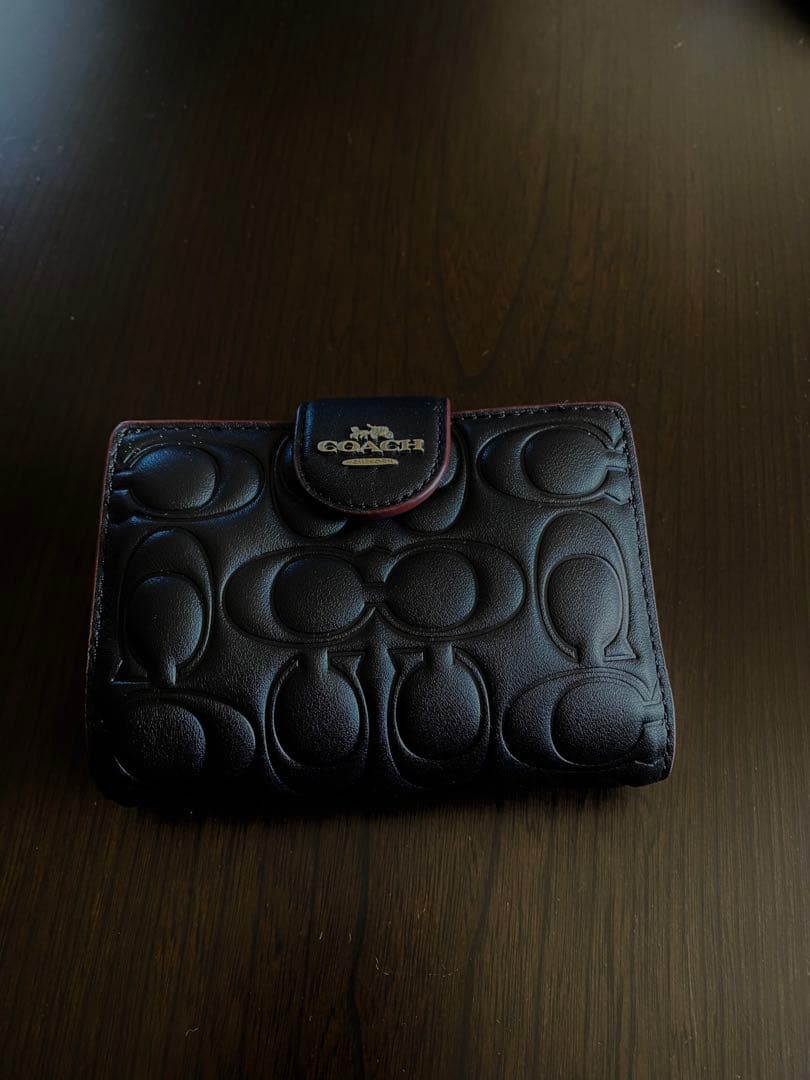 COACH エンボス加工 ブラック 二つ折り財布